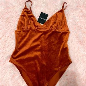 Burnt orange bodysuit